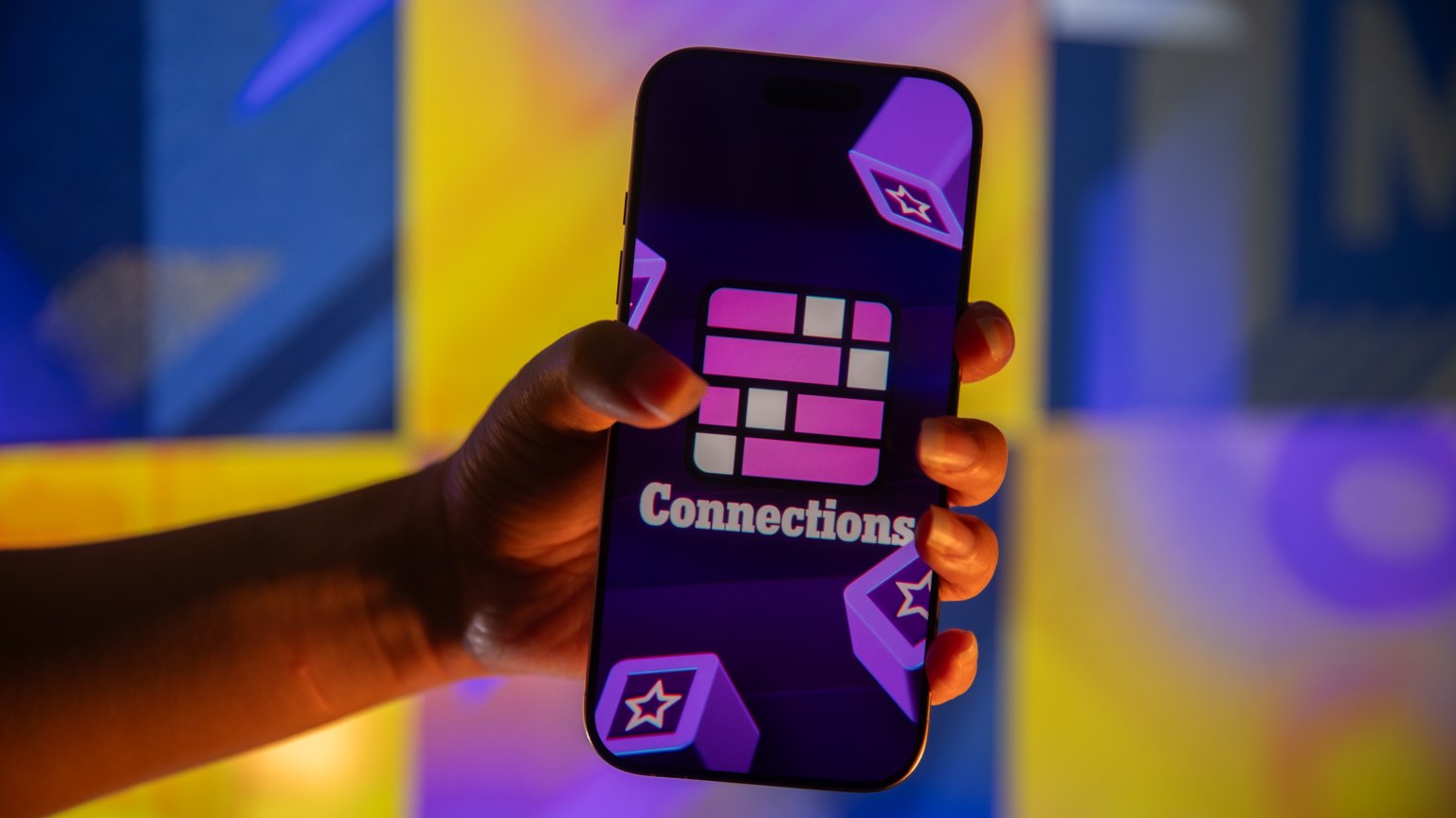 A phone displaying the New York Times game 'Connections.'