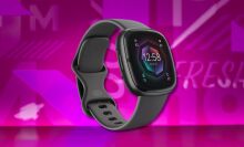 fitbit sense 2 fitness tracker against a pink patterned background