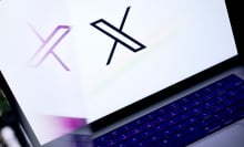 X logo on laptop