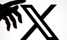 X logo with robot hand