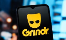 grindr logo on smartphone