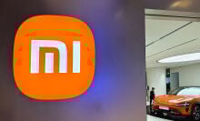 Xiaomi logo on wall