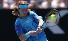 Tennis player Andrey Rublev plays a backhand in the Australian Open