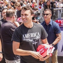 Charlie Kirk appears with supporters and security at a UC San Diego event