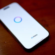 meta logo on a phone