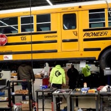 A diesel school bus is converted to an electric vehicle.