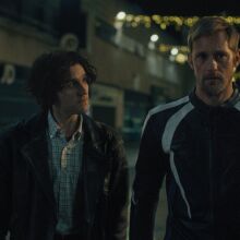 Harry Melling and Alexander Skarsgård in "Pillion."
