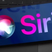 A Siri logo on a smartphone screen