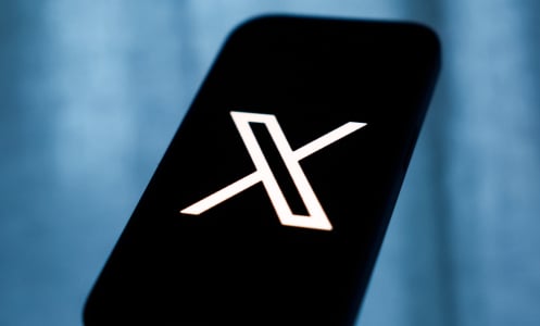 X logo on mobile device