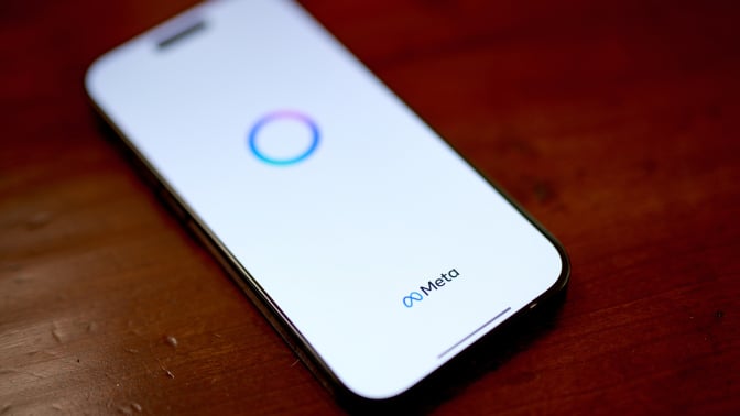 meta logo on a phone