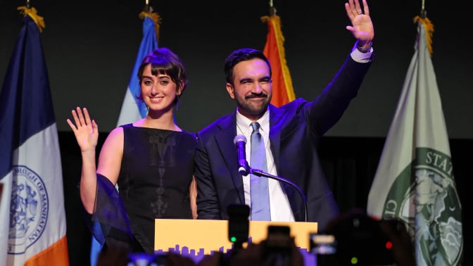 Rama Duwaji and Zohran Mamdani at a podium