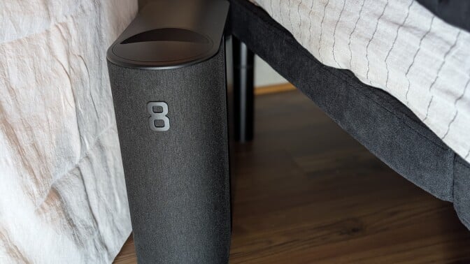 the eight sleep pod 5 hub next to a bed