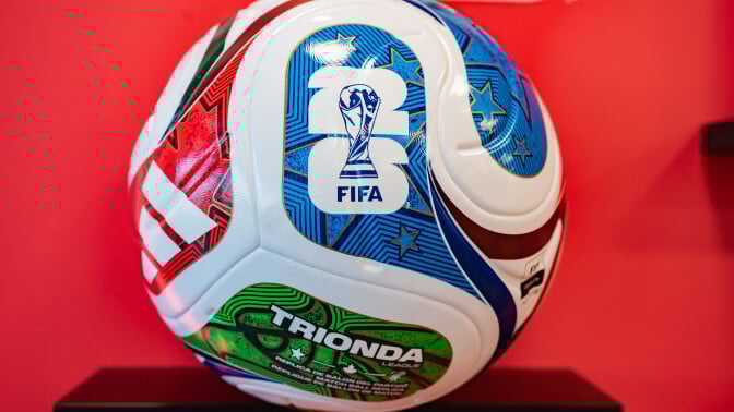  A football featuring the FIFA World Cup Trophy