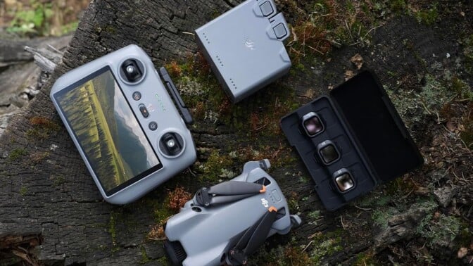 the DJI Mini 5 Pro Fly More Combo sitting outside with extra batteries and RC 2 remote