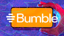  Hand holding phone with Bumble logo against abstract background