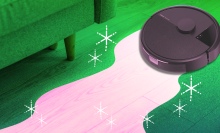 Pink and green illustration of roomba robot vacuum cleaning a floor near couch