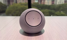 An Amazon Echo Dot Max speaker on a table