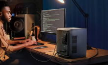 man working on computer hooked up to EcoFlow Delta 3 1000 Air