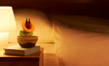 The Nintendo Talking Flower on a bedside table