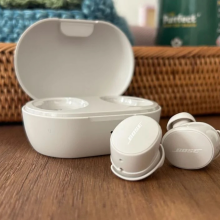 A pair of Bose QuietComfort earbuds