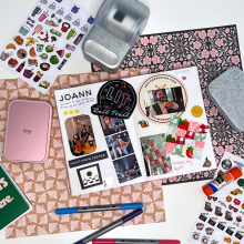 junk journal and crafting materials on a table