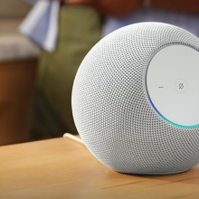 Amazon Echo Studio in glacier white on wood countertop