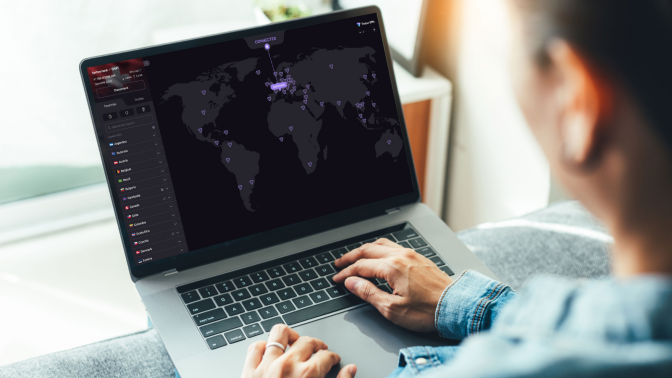 a close-up of a person using proton vpn on a laptop