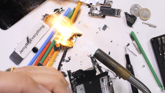 a blowtorch takin apart an iphone air via a blowtorch