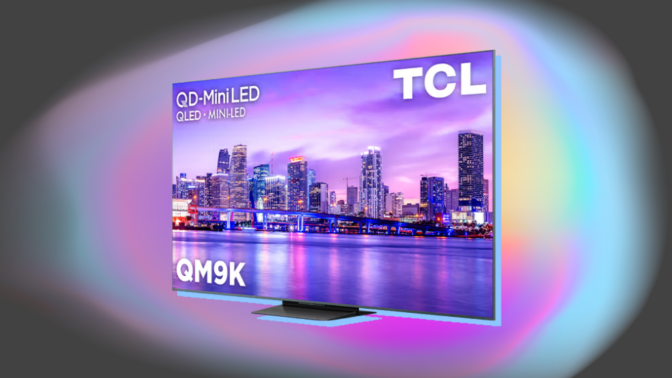 TCL QM9K TV arranged on gray backdrop with burst of color